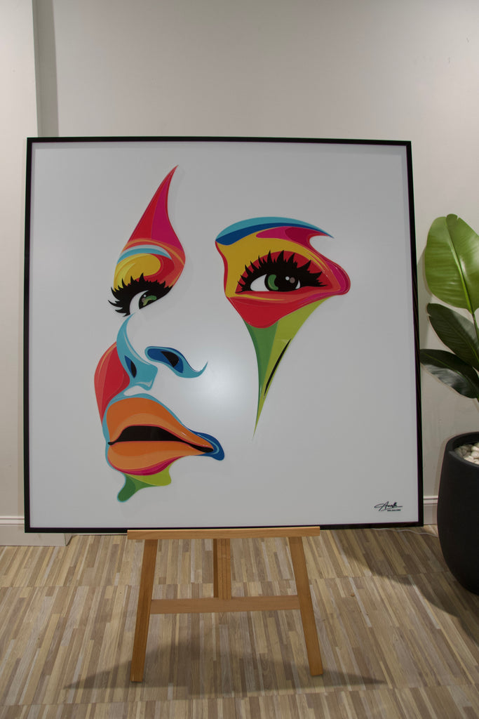 Abstract acrylic wall art of a woman's face in vibrant colors, designed to add elegance and bold style to modern interiors.