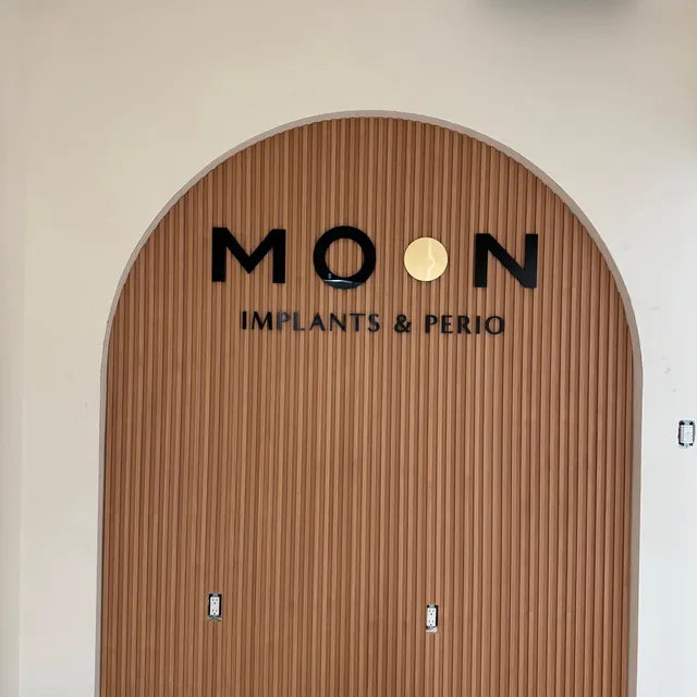 Moon implants - Custom Laser Cut Wall Logo